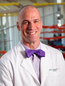 Dr. Daniel Benjamin, Jr., MD, PhD., MSP white coat pic