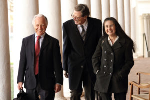 Mario R. Capecchi and Drs. Gomez & Sequeira Lopez walking