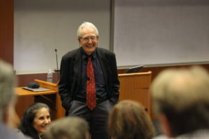 Dr. Klaus Rajewsky speaking to audience